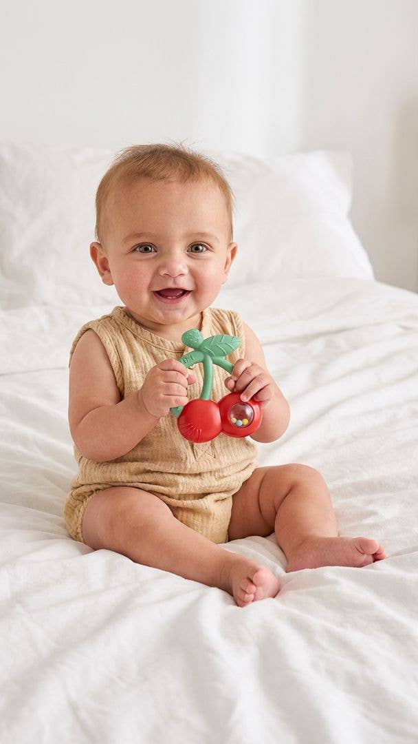 Bitzy Shake™ Silicone Teether with Rattle: Goose